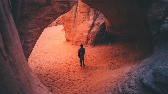 Standing on rock formation