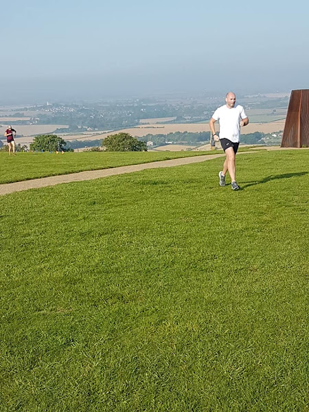 Ian running towards the finish funnel