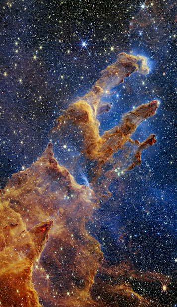 Pillars of Creation. A stellar nursery churns up hot young stars