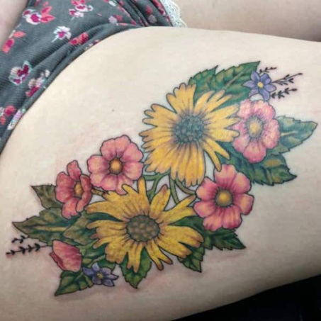 #flowerthightattoo