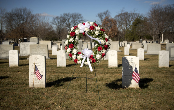 At Arlington National Cemetery, a wreath is placed near the graves of Apollo 1 astronauts Virgil Grissom and Roger Chaffee...on NASA's 2018 Day of Remembrance.