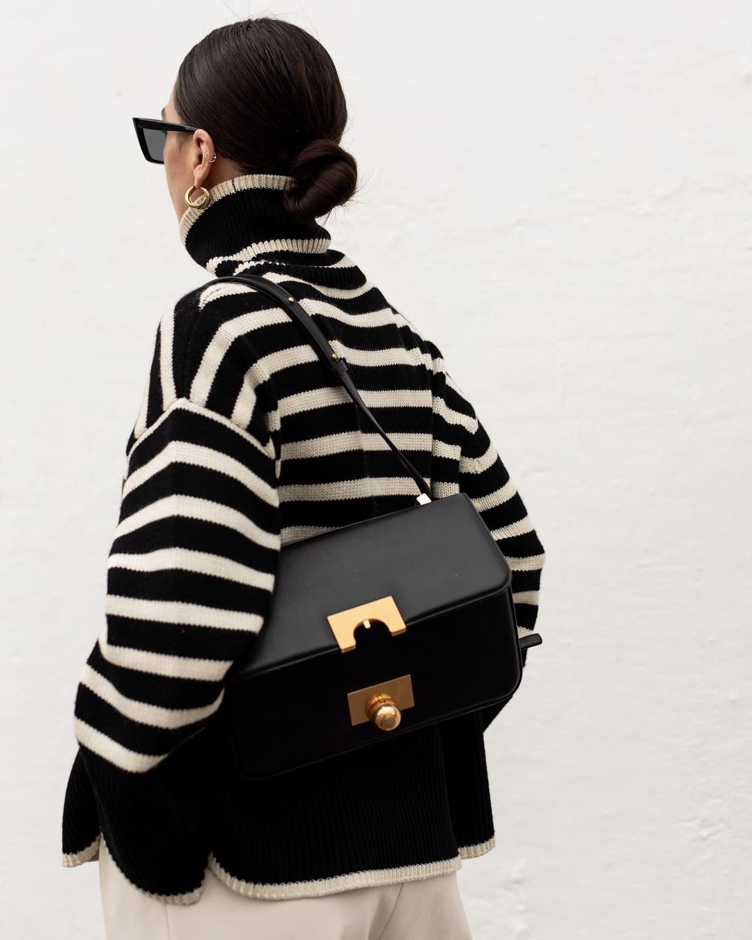 Winter Outfit Idea From Jessica Skye — Turtleneck Trend 2022 — Black Toteme Signature Striped Sweater 