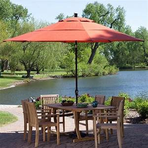 red color garden umbrella with dining set