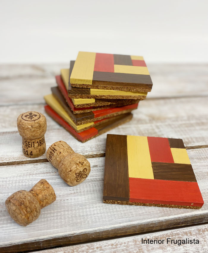 DIY instructions for how to recycle rectangular wooden blocks into unique wood tile mosaic drink coasters in pretty warm colors for fall decorating.