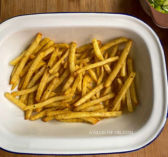 Seasoned fries in a dish