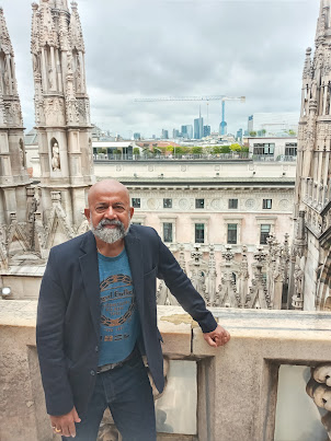 Narrator on roof of Milan Cathedral.