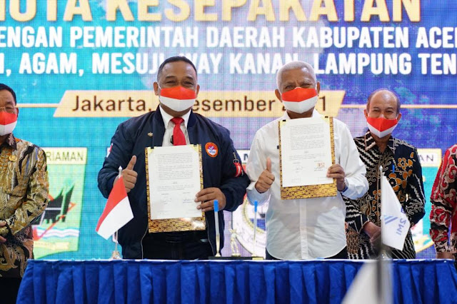 Lindungi PMI, Bupati Asahan Menandatangani Nota Kesepakatan dan Perjanjian Kerja dengan BP2MI