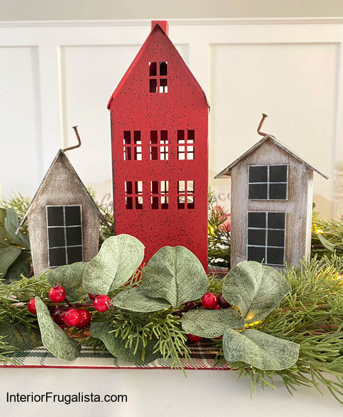 How to turn dollar store bird houses into adorable wood Scandi houses with DIY galvanized roofs for an easy five minute Christmas table centerpiece.