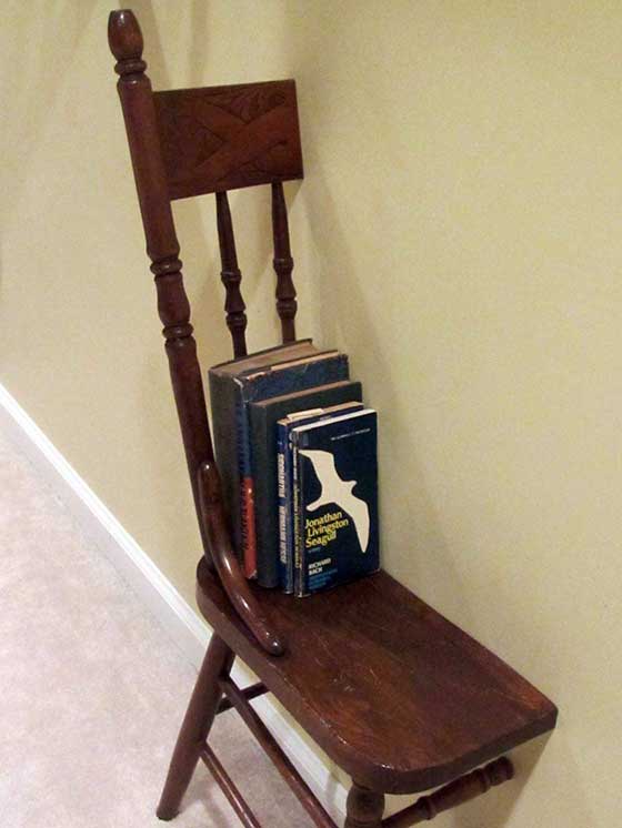 Half chair converted as book shelf