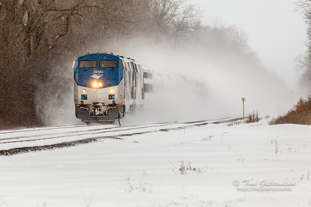 AMTK 112 leads the Lake Shore Limited past the milepost 298 marker