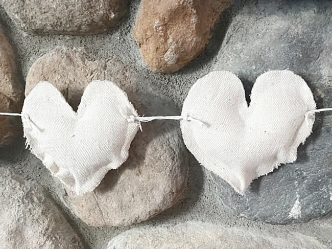 heart garland on the mantel