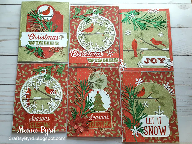 Variety of Christmas cards with cardinal, snowflakes, and foliage theme