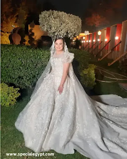 البطلة دينا طارق داون سندروم بفستان زفاف بدار الاوبرا