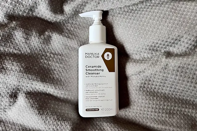 A white rectangular bottle with Ceramide Smoothing Cleanser by Manuka Doctor