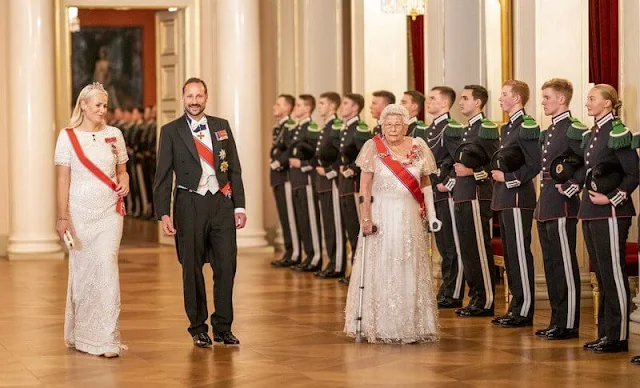 For the Parliament gala dinner, Crown Princess Mette-Marit wore a gown by Emilio Pucci. King Harald and Queen Sonja