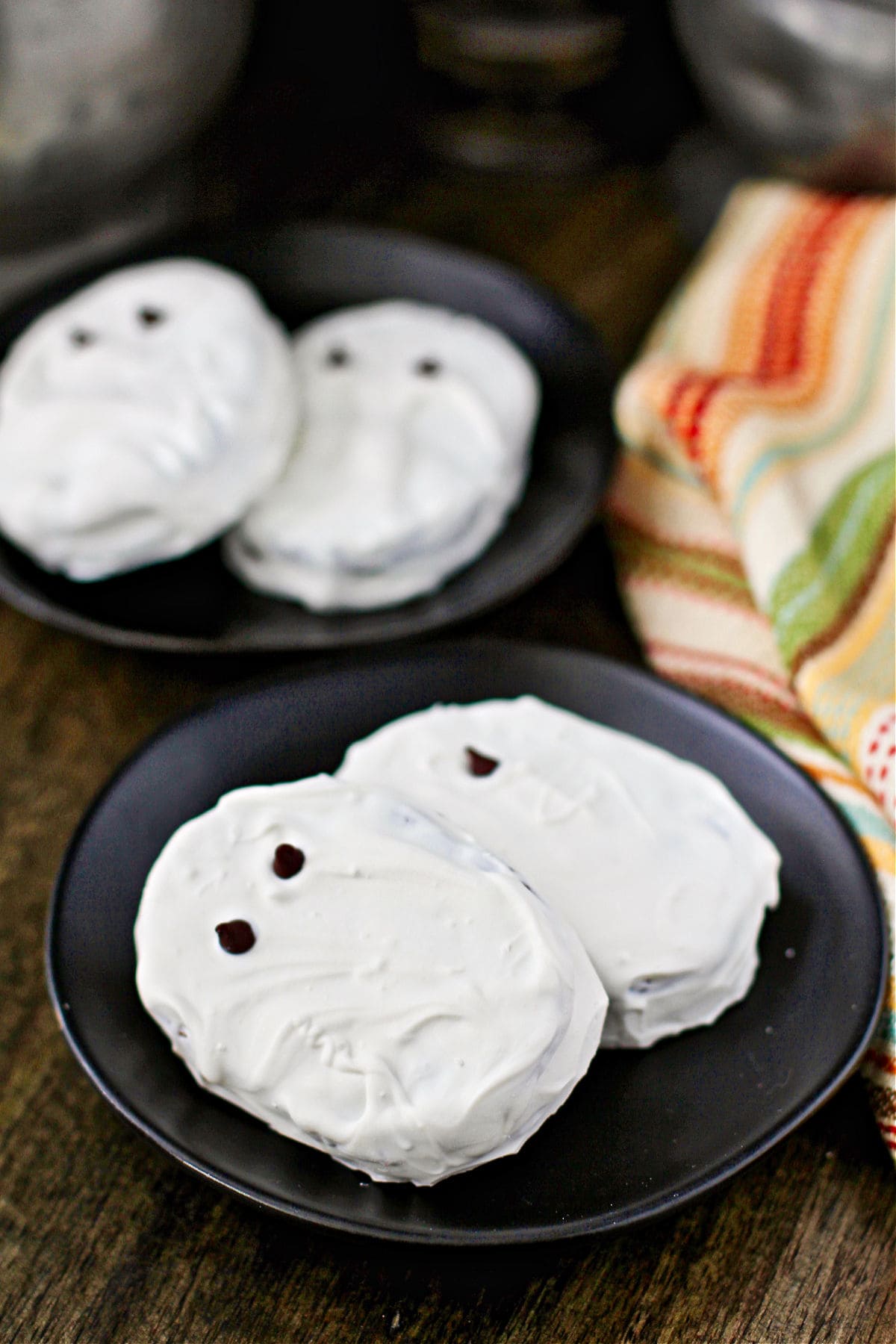 Peanut Butter Ghost Cookies with candy coating.