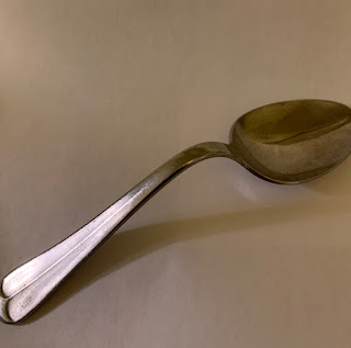 Spoon bent mentally by The Amazing Randi