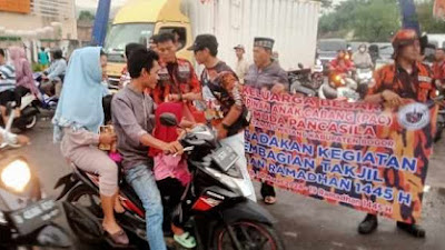 PAC dan Ranting Pemuda Pancasila Kec. Leuwiliang Bagikan 1000 Paket Boks Makanan.