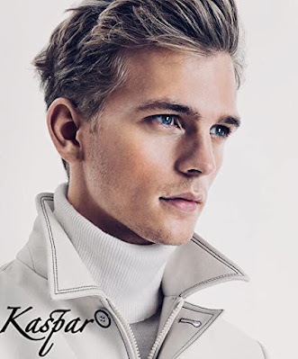 Nordic male model in a crisp white turtle neck sweater and white leather coat the caption says Kaspar