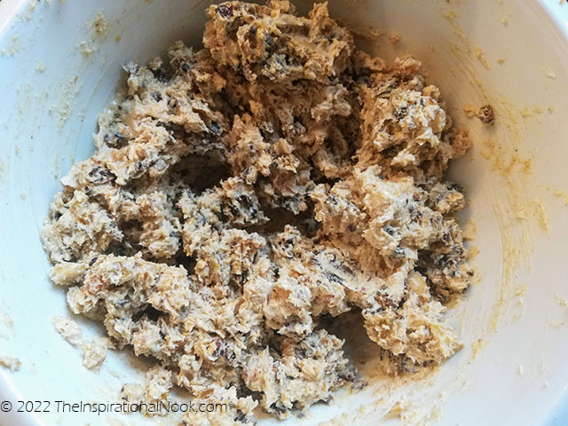 Add fruit and nuts to Indian Christmas cake batter