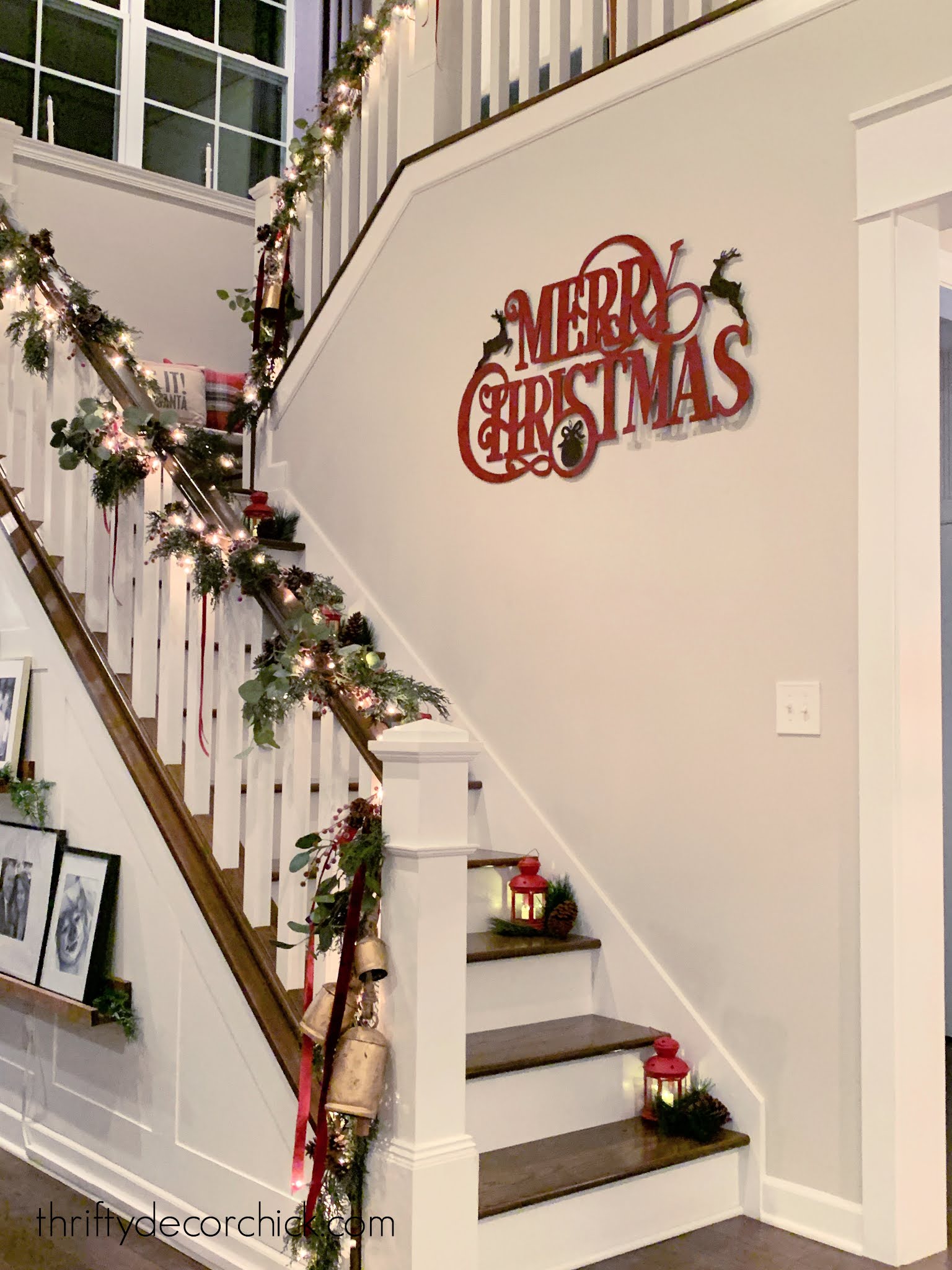 garland and berries on stair railings