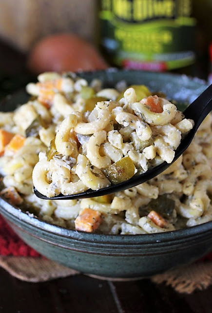 Serving Spoon with Dill Pickle Macaroni Salad Image