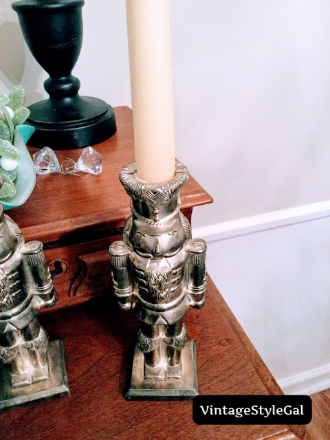 Candle standing straight in candlestick