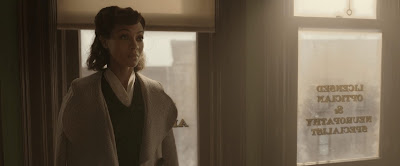 Zoe Saldaña as Irma St. Clair, a medical examiner