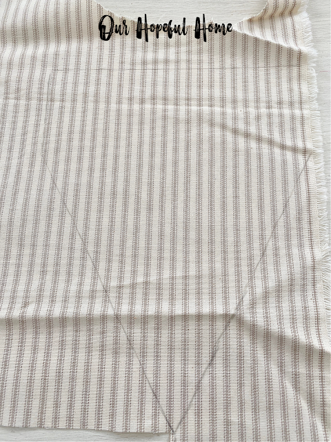 beige and white cotton ticking fabric