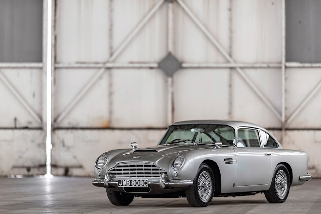 1963 – 1965 Aston Martin DB5 (42) front and left side view; 3-4 medium-wide shot.