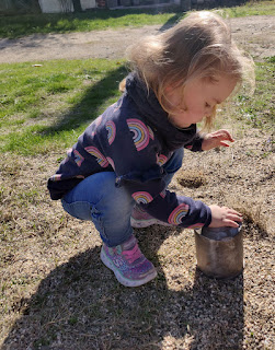 Rosie playing with the sand