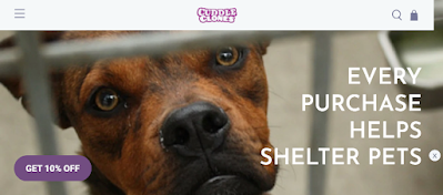 image shows sad dog behind cage bars. Text reads: Cuddle Clones Every Purchase Helps Support Shelter Pets