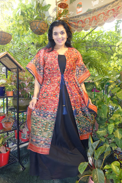 Digital print silk chanderi Patola cape. It comes with this black anarkali and can be paired on top of any outfit.