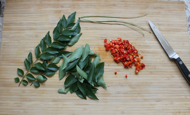 Chili peppers and fresh curry leaves