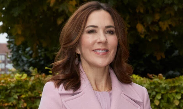 Crown Princess Mary wore a pink ceri double breasted coat by Andiata. Boss banora pink pleat neck silk blouse. Apiece Apart skirt