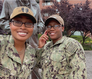 ENS Russell's (left) first reenlistment as an officer with HM3 Lewis (right), whom she recruited when she was a recruiter at NRD (Navy Recruiting District) Phoenix. (Photo credit: ENS Alexius Russell, USU)