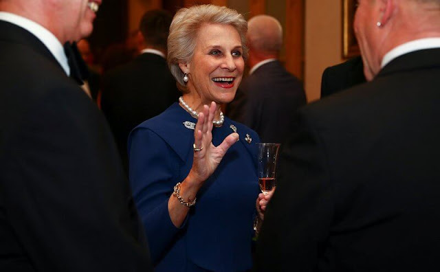 Duchess of Gloucester wore a blue dress, diamond brooch, and pearls necklace