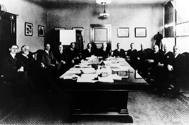 A photo of Orville Wright, R/Adm Moffet and Dr Ames in a meeting of national advisory committee for aeronautics, NACA, predecessor of NASA.