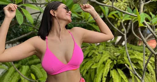 Mrunal Thakur cleavage pink bikini top