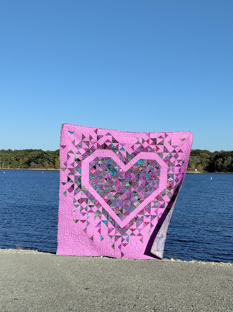 Exploding Heart quilt in the Emperor collection from Kaffe Fassett Studios