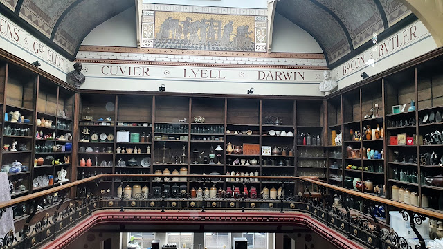Secret part of Derby Museum, above the library. A square balcony with shelves full of potions boxes and unexhibited items