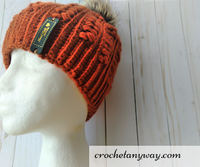 Pumpkin crochet winter hat with pom pom