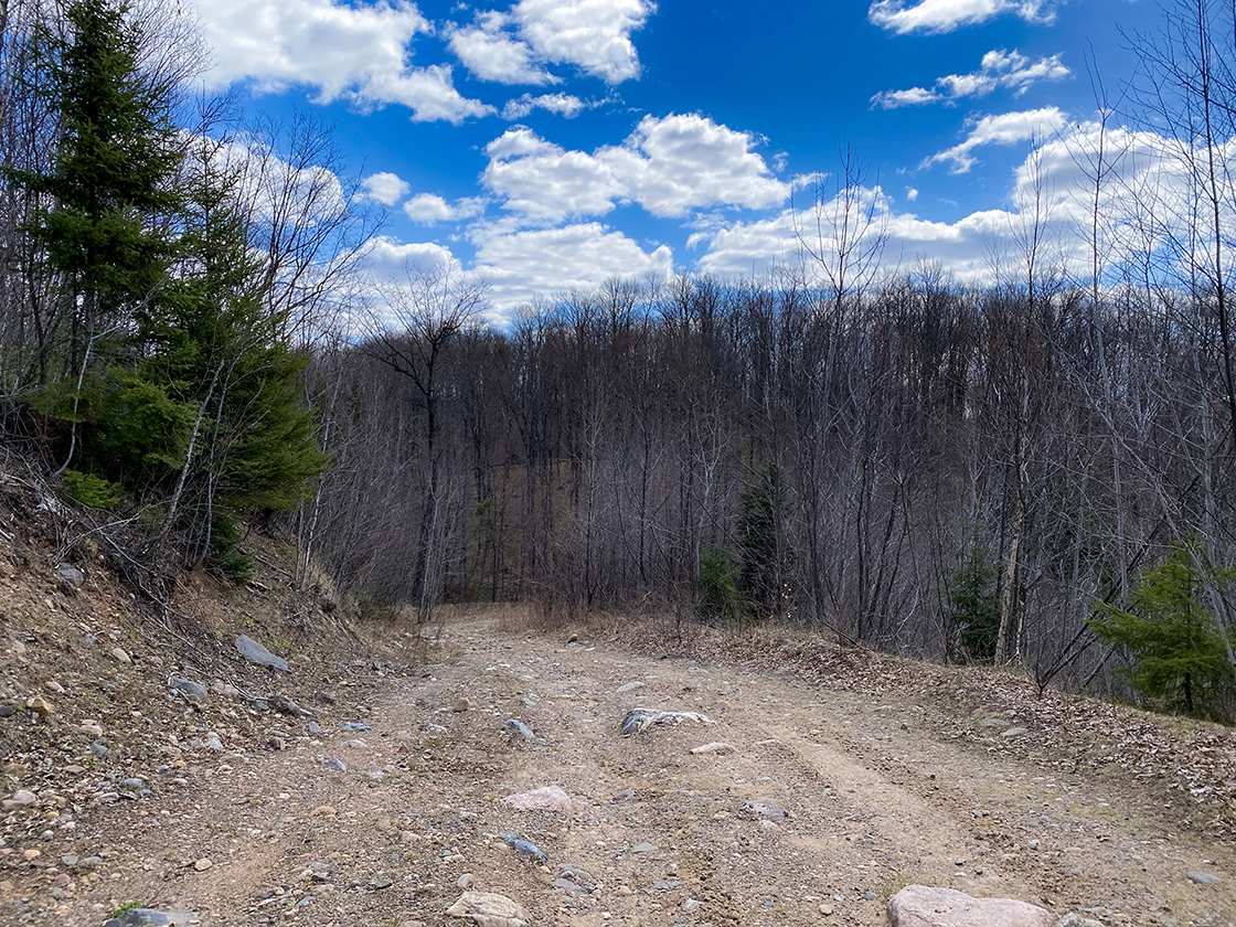 rocky gravel road going downhill