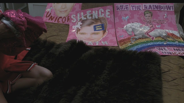 Brittany's sparkly, pink, unicorn, rainbow, campaign posters for Kurt