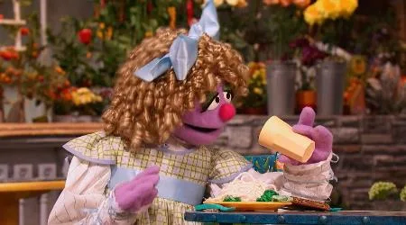 purple Sesame Street character Goldilocks