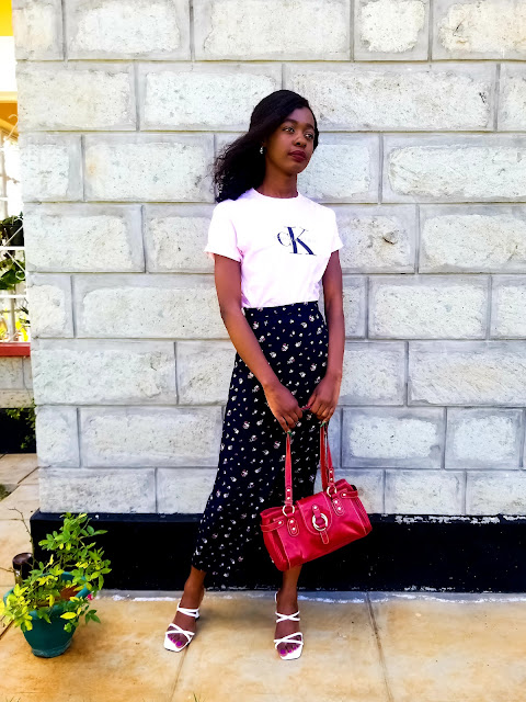 How To Wear A Midi Skirt With A Graphics T-Shirt