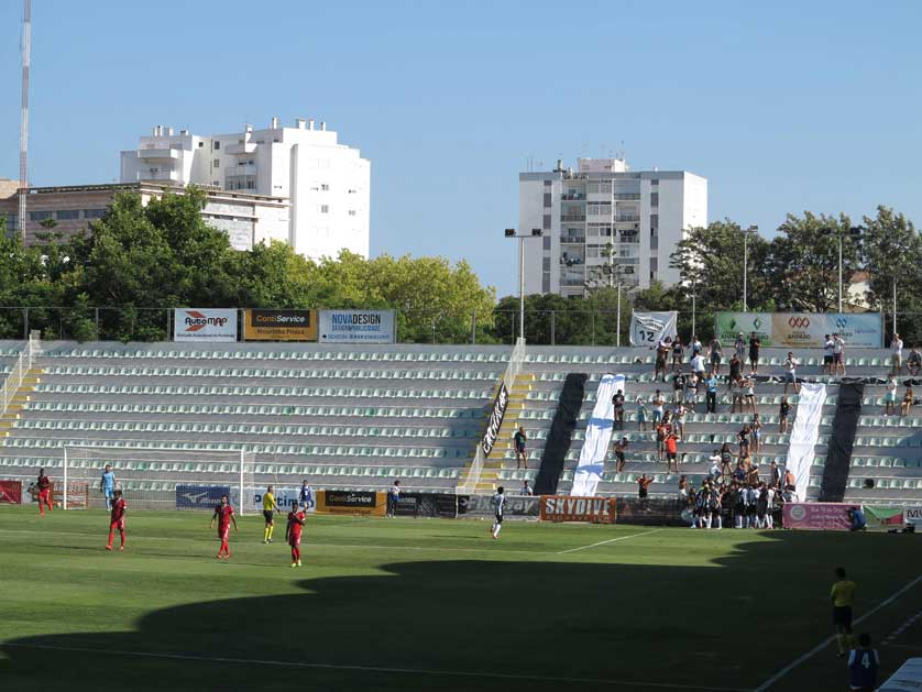 Only one stand of the stadium is covered.