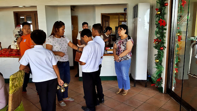 "Pahalik" boys rounding the Veranda Restaurant of Leyte Park Hotel