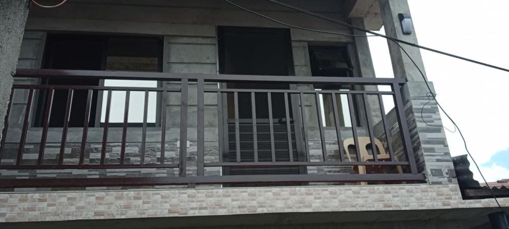 Fishball vendor builds 2-storey house for his family