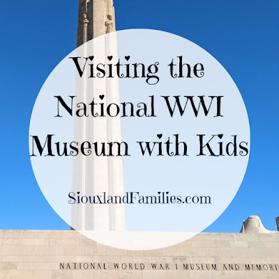 in the background, the tower of the National World War I Memorial against a blue sky. In the foreground, the post title